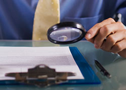 review-inspect-250px Inspect paperwork with magnifying glass