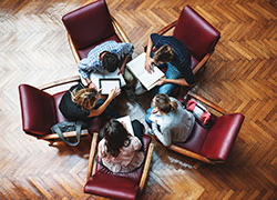 How can the industry help young advisers?